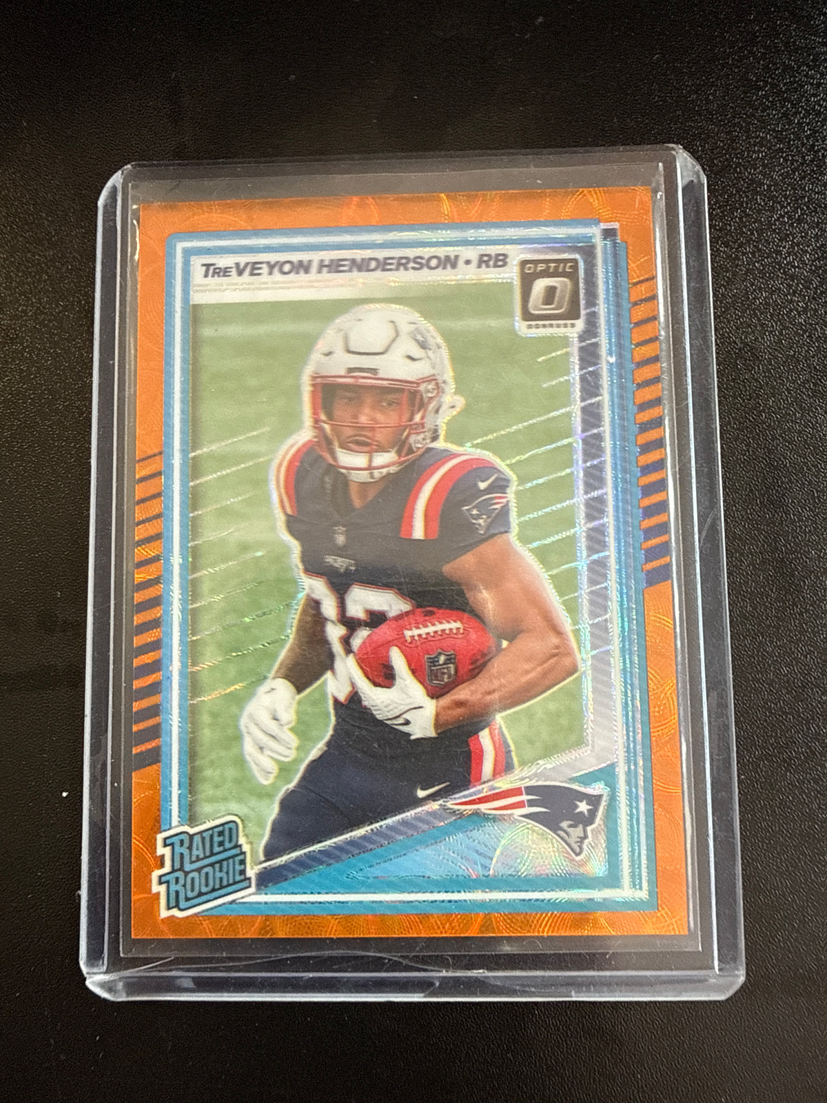 2025 Donruss Optic #248 TreVeyon Henderson Rated Rookie Orange Scope #67/79 New England Patriots front